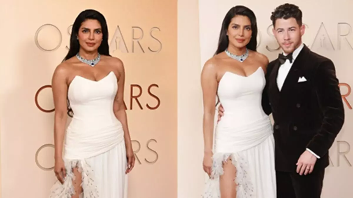 Oscars 2026: निक जोनस का हाथ थामे रेड कार्पेट पर उतरीं प्रियंका चोपड़ा, व्हाइट गाउन में दिखीं बेहद ग्लैमरस
